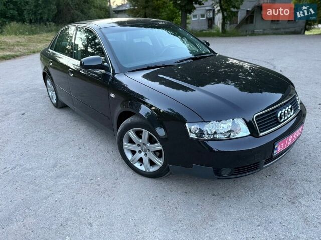Черный Ауди А4, объемом двигателя 1.6 л и пробегом 215 тыс. км за 5300 $, фото 1 на Automoto.ua