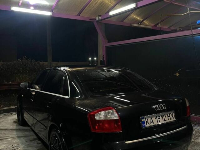 Черный Ауди А4, объемом двигателя 2.5 л и пробегом 365 тыс. км за 4900 $, фото 1 на Automoto.ua