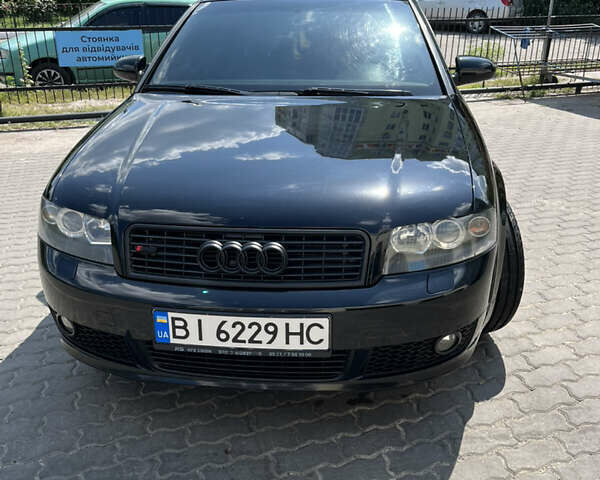 Чорний Ауді А4, об'ємом двигуна 2 л та пробігом 217 тис. км за 6300 $, фото 1 на Automoto.ua