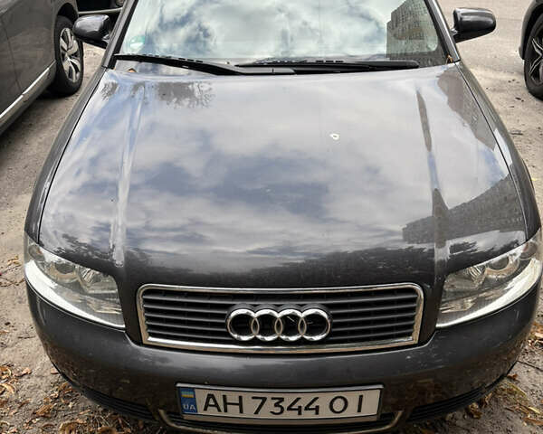 Черный Ауди А4, объемом двигателя 2 л и пробегом 175 тыс. км за 5500 $, фото 1 на Automoto.ua
