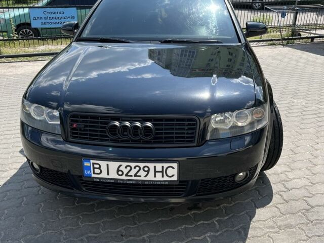 Чорний Ауді А4, об'ємом двигуна 2 л та пробігом 215 тис. км за 6200 $, фото 1 на Automoto.ua