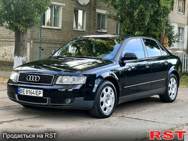 Черный Ауди А4, объемом двигателя 1.8 л и пробегом 260 тыс. км за 5000 $, фото 1 на Automoto.ua