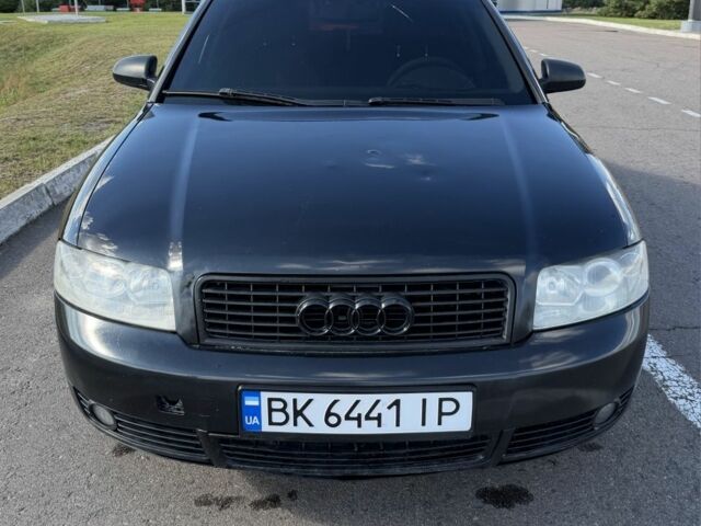 Чорний Ауді А4, об'ємом двигуна 2 л та пробігом 420 тис. км за 3657 $, фото 1 на Automoto.ua