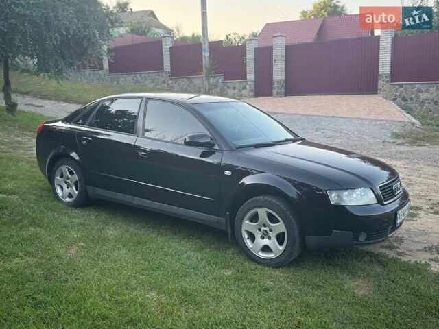 Чорний Ауді А4, об'ємом двигуна 1.6 л та пробігом 260 тис. км за 4500 $, фото 1 на Automoto.ua