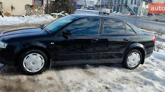 Чорний Ауді А4, об'ємом двигуна 2 л та пробігом 384 тис. км за 5700 $, фото 1 на Automoto.ua
