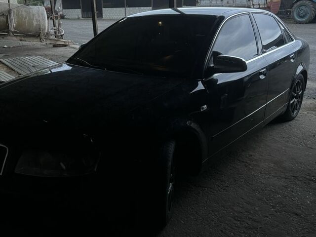 Черный Ауди А4, объемом двигателя 2.5 л и пробегом 250 тыс. км за 4100 $, фото 1 на Automoto.ua