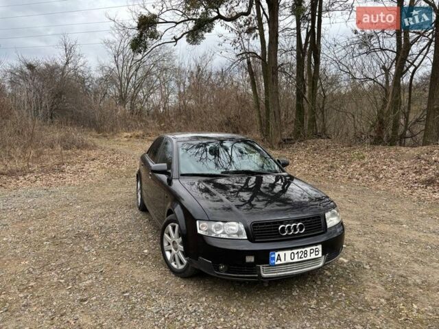 Черный Ауди А4, объемом двигателя 2.5 л и пробегом 420 тыс. км за 4300 $, фото 1 на Automoto.ua