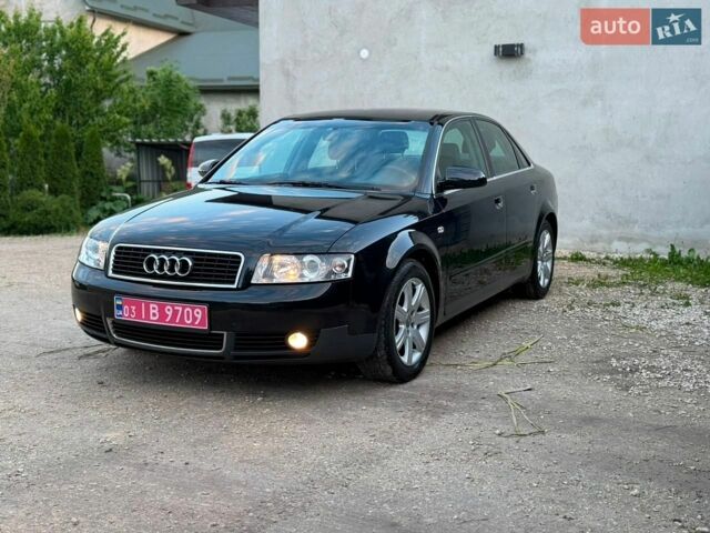 Чорний Ауді А4, об'ємом двигуна 1.6 л та пробігом 215 тис. км за 5300 $, фото 1 на Automoto.ua