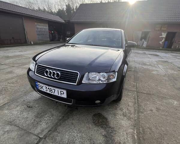 Черный Ауди А4, объемом двигателя 1.6 л и пробегом 243 тыс. км за 4600 $, фото 1 на Automoto.ua