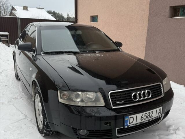 Черный Ауди А4, объемом двигателя 1.8 л и пробегом 392 тыс. км за 4800 $, фото 1 на Automoto.ua