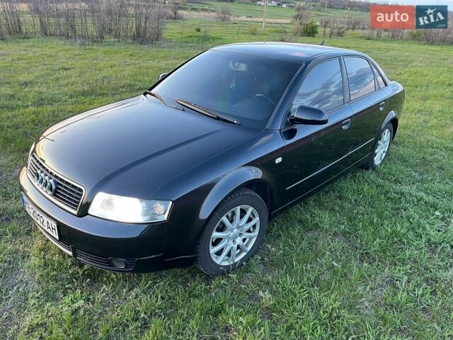 Черный Ауди А4, объемом двигателя 2 л и пробегом 270 тыс. км за 6200 $, фото 1 на Automoto.ua