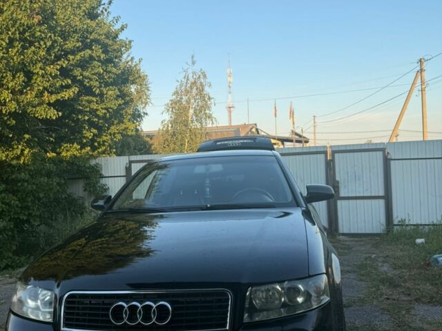 Черный Ауди А4, объемом двигателя 1.6 л и пробегом 302 тыс. км за 4298 $, фото 1 на Automoto.ua