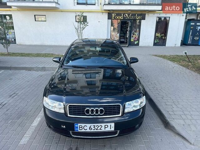 Чорний Ауді А4, об'ємом двигуна 1.6 л та пробігом 258 тис. км за 5000 $, фото 1 на Automoto.ua