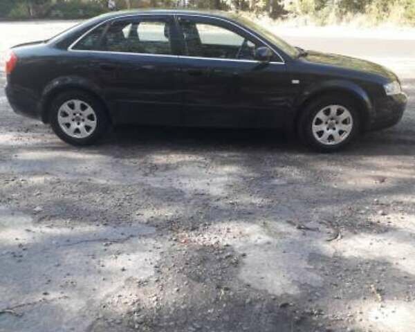 Черный Ауди А4, объемом двигателя 1.6 л и пробегом 213 тыс. км за 5000 $, фото 1 на Automoto.ua