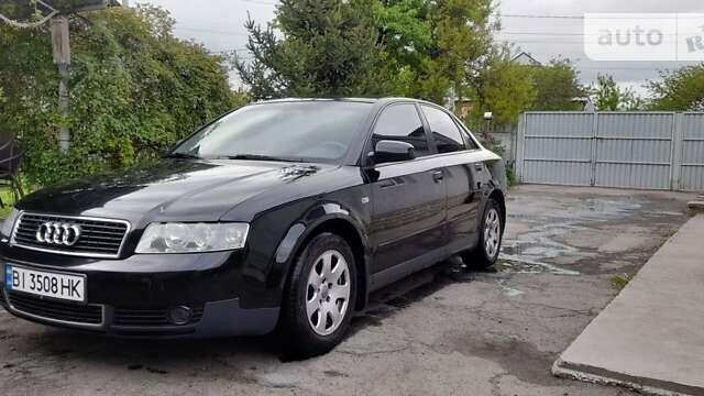 Чорний Ауді А4, об'ємом двигуна 1.6 л та пробігом 291 тис. км за 6200 $, фото 1 на Automoto.ua