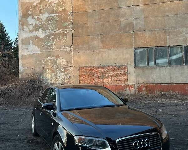 Черный Ауди А4, объемом двигателя 2 л и пробегом 240 тыс. км за 7200 $, фото 1 на Automoto.ua