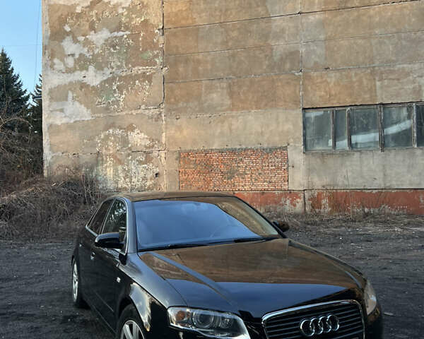 Черный Ауди А4, объемом двигателя 2 л и пробегом 240 тыс. км за 7300 $, фото 1 на Automoto.ua