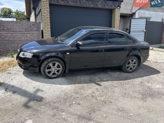 Черный Ауди А4, объемом двигателя 2 л и пробегом 394 тыс. км за 5700 $, фото 1 на Automoto.ua