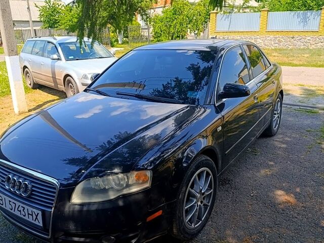 Черный Ауди А4, объемом двигателя 2 л и пробегом 314 тыс. км за 6000 $, фото 1 на Automoto.ua