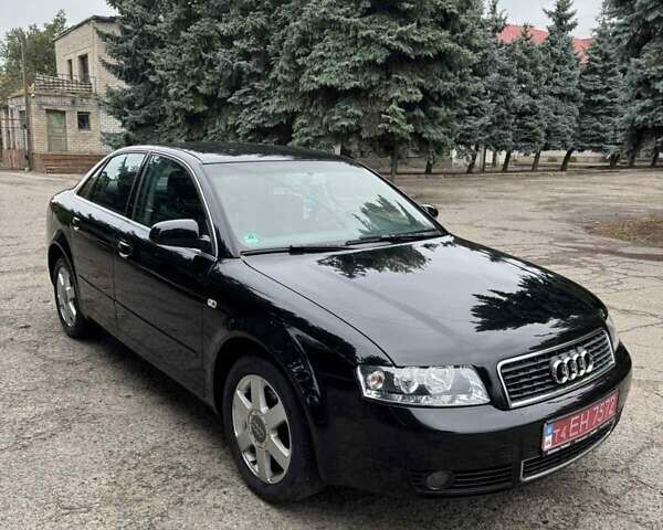 Черный Ауди А4, объемом двигателя 1.6 л и пробегом 198 тыс. км за 6100 $, фото 1 на Automoto.ua