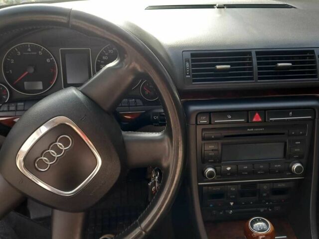 Черный Ауди А4, объемом двигателя 2 л и пробегом 234 тыс. км за 4900 $, фото 1 на Automoto.ua