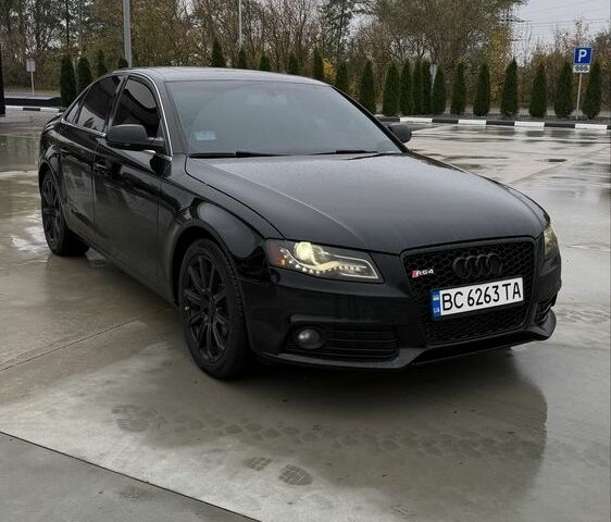 Черный Ауди А4, объемом двигателя 2 л и пробегом 227 тыс. км за 8306 $, фото 1 на Automoto.ua