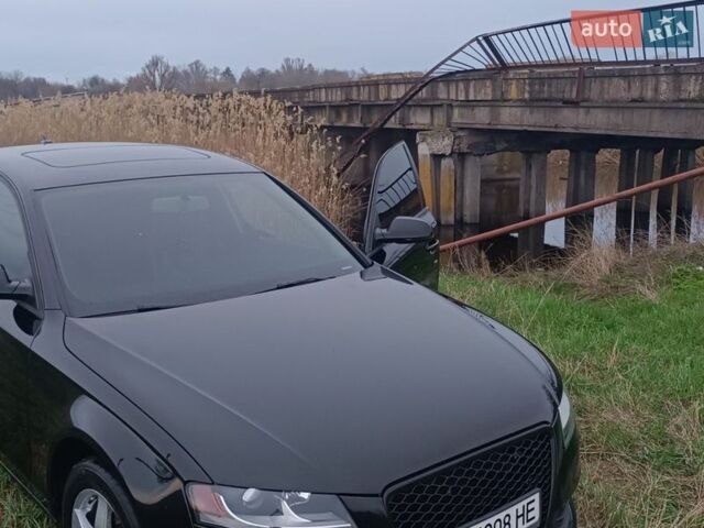 Черный Ауди А4, объемом двигателя 2 л и пробегом 305 тыс. км за 10500 $, фото 1 на Automoto.ua