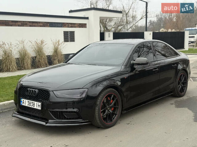 Черный Ауди А4, объемом двигателя 1.97 л и пробегом 150 тыс. км за 13799 $, фото 1 на Automoto.ua