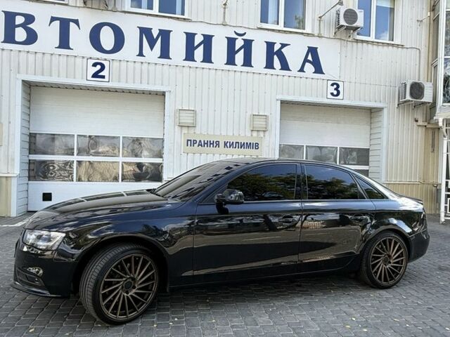 Черный Ауди А4, объемом двигателя 1.8 л и пробегом 170 тыс. км за 11848 $, фото 1 на Automoto.ua