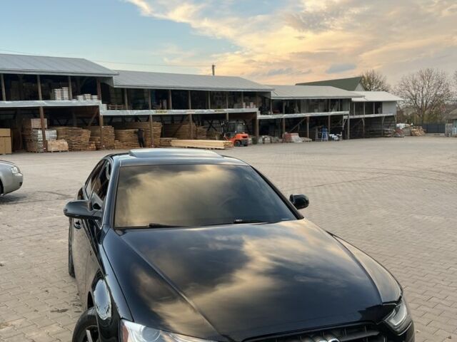 Чорний Ауді А4, об'ємом двигуна 2 л та пробігом 198 тис. км за 10900 $, фото 1 на Automoto.ua