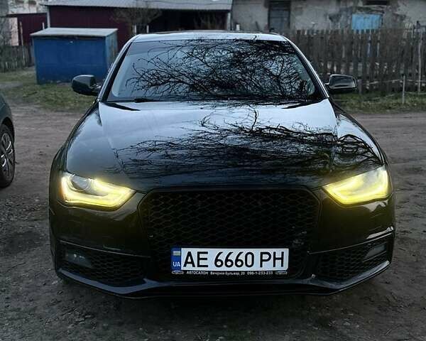 Черный Ауди А4, объемом двигателя 2 л и пробегом 170 тыс. км за 13538 $, фото 1 на Automoto.ua