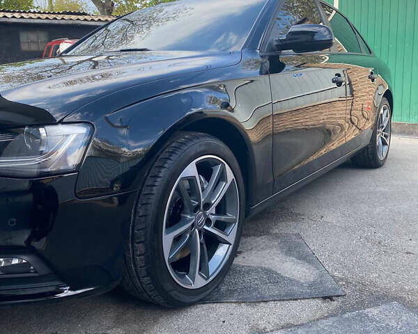Черный Ауди А4, объемом двигателя 2 л и пробегом 233 тыс. км за 13500 $, фото 1 на Automoto.ua