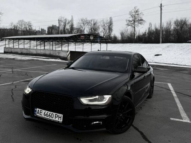 Чорний Ауді А4, об'ємом двигуна 2 л та пробігом 170 тис. км за 13538 $, фото 1 на Automoto.ua