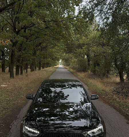 Черный Ауди А4, объемом двигателя 2 л и пробегом 245 тыс. км за 12200 $, фото 1 на Automoto.ua