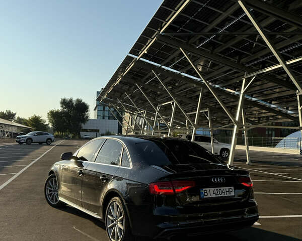 Черный Ауди А4, объемом двигателя 1.98 л и пробегом 176 тыс. км за 13699 $, фото 1 на Automoto.ua