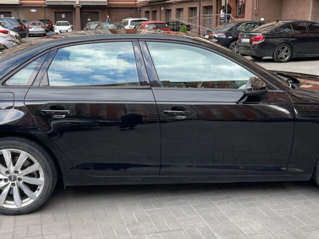 Черный Ауди А4, объемом двигателя 2 л и пробегом 70 тыс. км за 18500 $, фото 1 на Automoto.ua