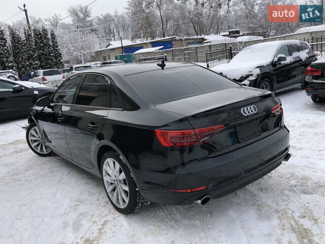 Чорний Ауді А4, об'ємом двигуна 2 л та пробігом 106 тис. км за 11989 $, фото 1 на Automoto.ua