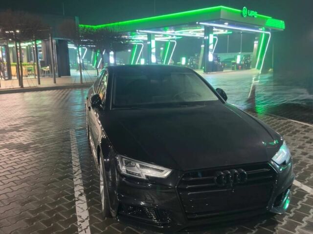 Чорний Ауді А4, об'ємом двигуна 2 л та пробігом 124 тис. км за 23950 $, фото 1 на Automoto.ua