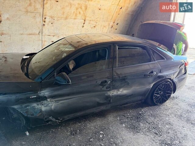 Чорний Ауді А4, об'ємом двигуна 1.98 л та пробігом 143 тис. км за 7000 $, фото 1 на Automoto.ua