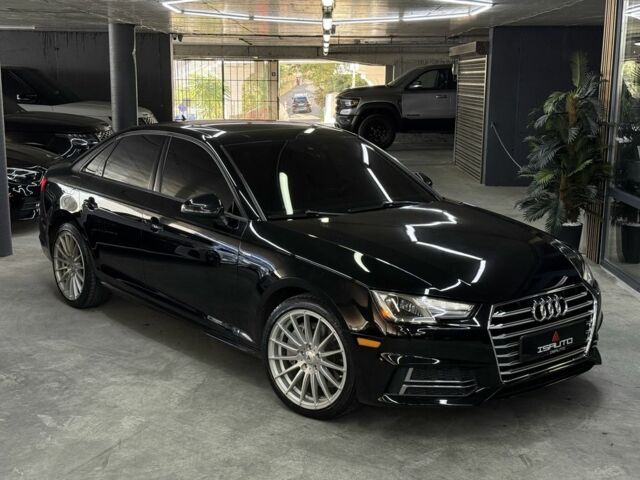Чорний Ауді А4, об'ємом двигуна 2 л та пробігом 124 тис. км за 18700 $, фото 1 на Automoto.ua