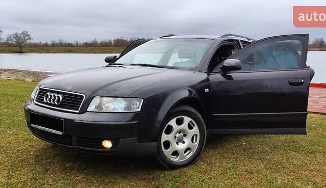 Черный Ауди А4, объемом двигателя 2.5 л и пробегом 395 тыс. км за 4400 $, фото 1 на Automoto.ua