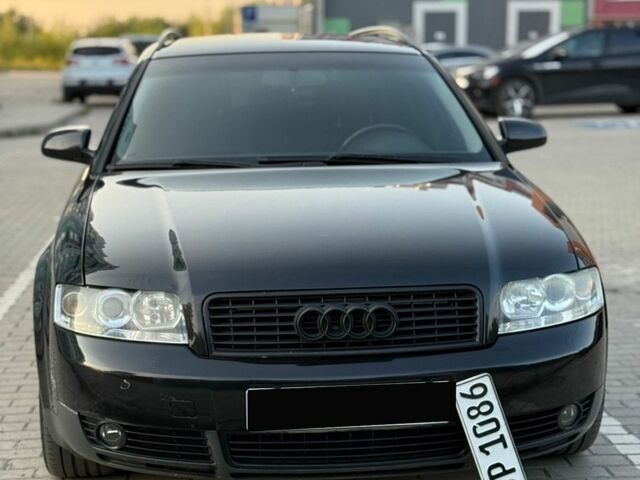 Чорний Ауді А4, об'ємом двигуна 2 л та пробігом 242 тис. км за 5999 $, фото 1 на Automoto.ua