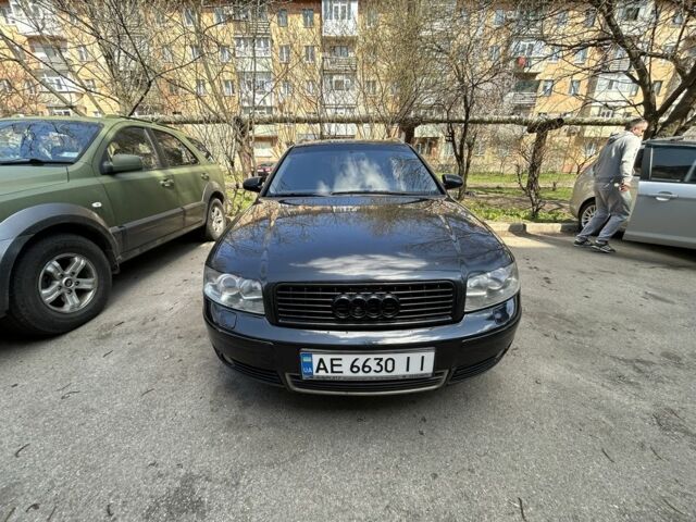 Черный Ауди А4, объемом двигателя 2.5 л и пробегом 300 тыс. км за 3900 $, фото 1 на Automoto.ua