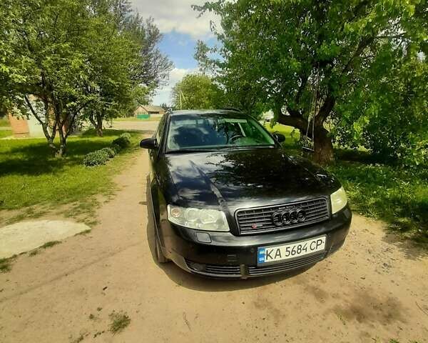 Черный Ауди А4, объемом двигателя 2.5 л и пробегом 313 тыс. км за 4400 $, фото 1 на Automoto.ua