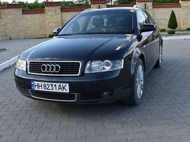 Черный Ауди А4, объемом двигателя 2.5 л и пробегом 330 тыс. км за 4800 $, фото 1 на Automoto.ua