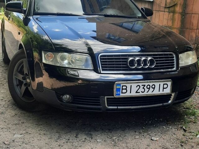 Черный Ауди А4, объемом двигателя 2.5 л и пробегом 300 тыс. км за 6000 $, фото 1 на Automoto.ua