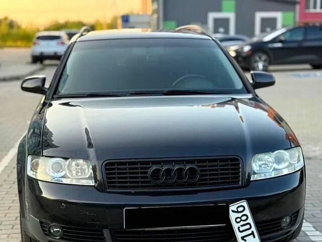 Чорний Ауді А4, об'ємом двигуна 2 л та пробігом 242 тис. км за 5999 $, фото 1 на Automoto.ua