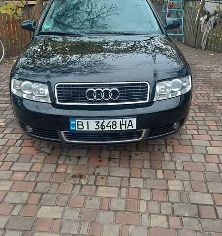 Черный Ауди А4, объемом двигателя 1.6 л и пробегом 212 тыс. км за 4200 $, фото 1 на Automoto.ua