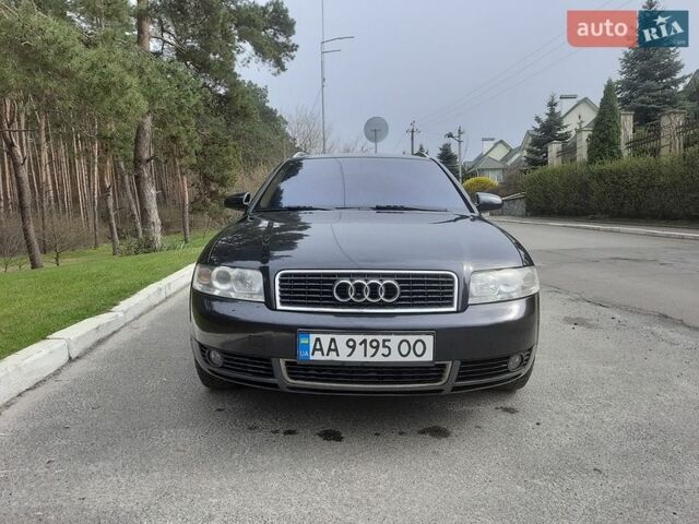 Черный Ауди А4, объемом двигателя 2 л и пробегом 375 тыс. км за 4200 $, фото 1 на Automoto.ua
