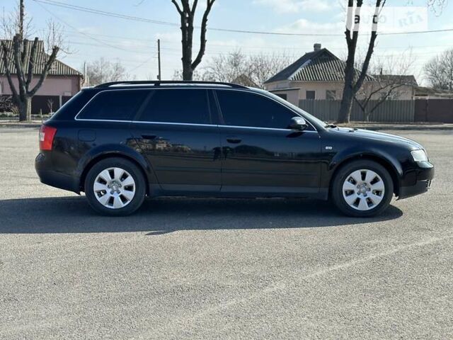 Черный Ауди А4, объемом двигателя 2.5 л и пробегом 210 тыс. км за 4950 $, фото 1 на Automoto.ua